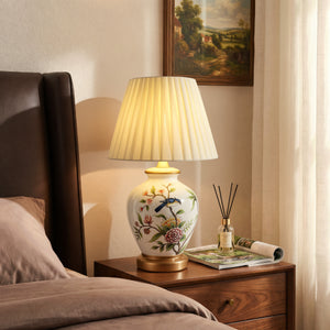 White Chinoiserie Hand-Painted Ceramic Table Lamp table lamp on a bedroom bedside