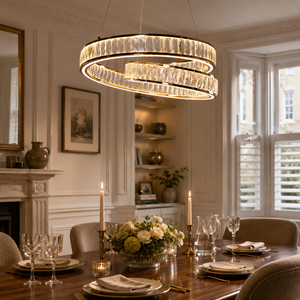 elegant gold crystal swirl pendant light in a sunlit breakfast nook