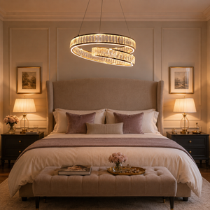 elegant gold crystal swirl pendant light beside a bright window