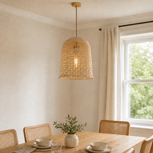 Natural woven bamboo pendant light over a bright dining table