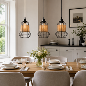rattan iron basket pendant light over a wooden dining table