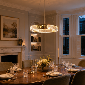 luxurious gold crystal led pendant light beside a bright window