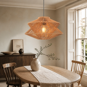 khaki brown paper rope pendant light above a bright dining table