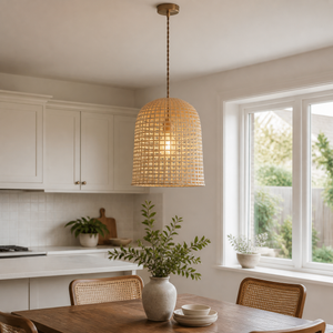 Warm bamboo shade pendant near a kitchen window