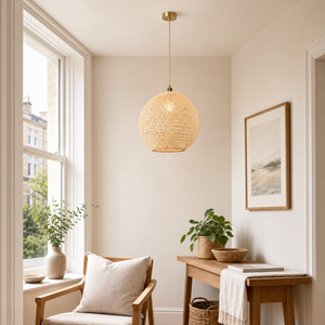 bamboo pendant light above a bright dining table