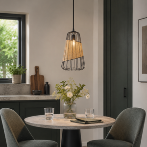 rattan iron lantern pendant light above a cozy living room table