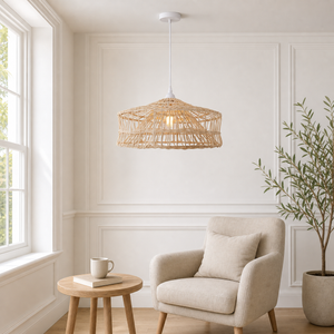 nestline handwoven shallow lamp pendant light above a bright dining table