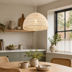 Handwoven white rope pendant over a kitchen dining area