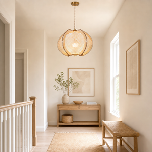 wood pendant light over a warm kitchen counter