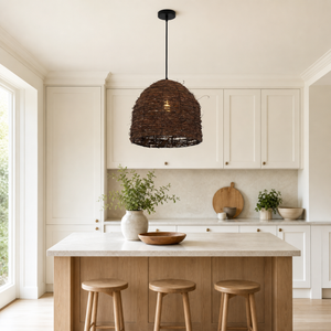rattan dome pendant light above a bright dining table