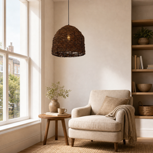 rattan dome pendant light above a bright dining table