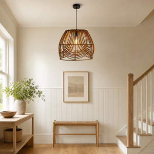 rattan pendant light beside a bright window