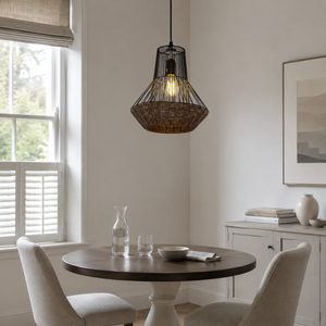 rattan iron pendant light over a warm kitchen counter