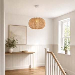 rattan pendant light beside a bright window