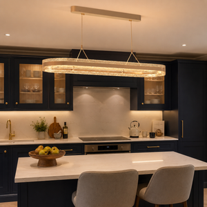 aluminium pendant light over a warm kitchen counter