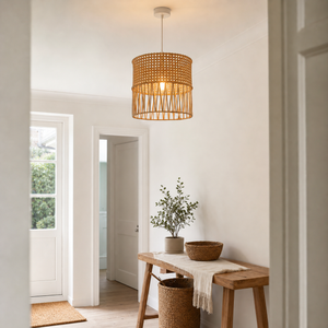 rattan pendant light beside a bright window