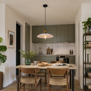 white iron pendant light above a kitchen dining table