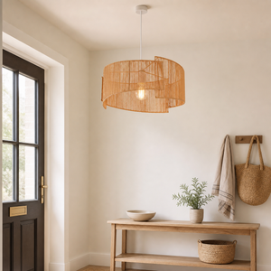 paper rope pendant light beside a bright window