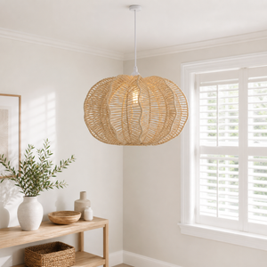 rattan pendant light in a sunlit breakfast nook