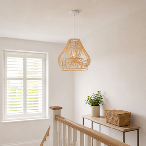 rattan pendant light above a bright dining table