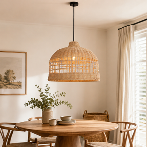 Lattice rattan pendant over a wooden dining table