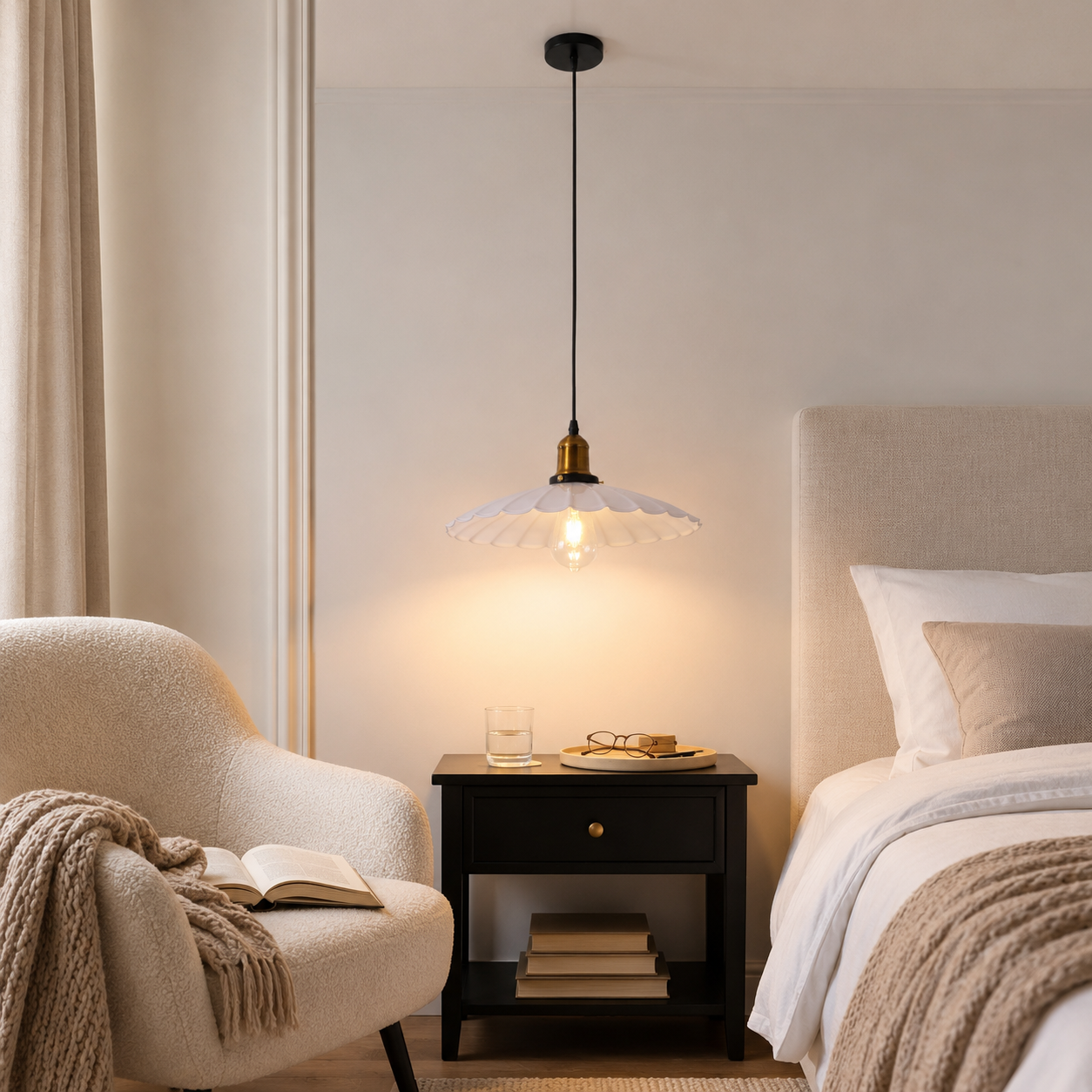 white iron pendant light beside a bed with soft warm light