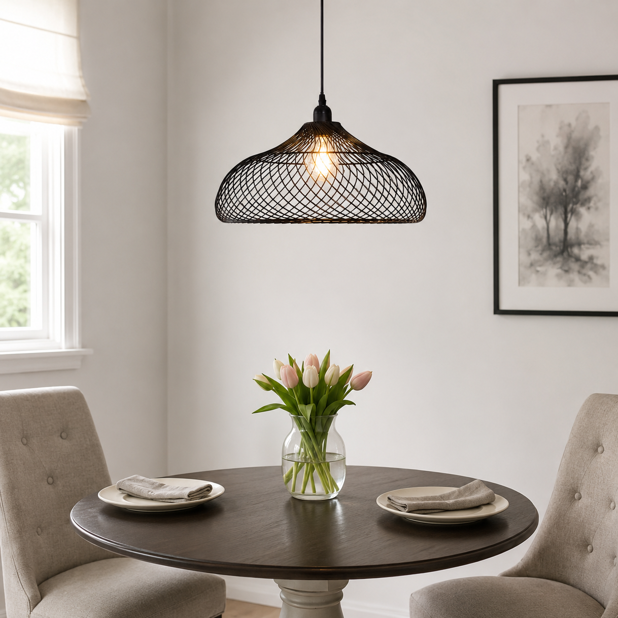 black iron pendant light above a bright dining table