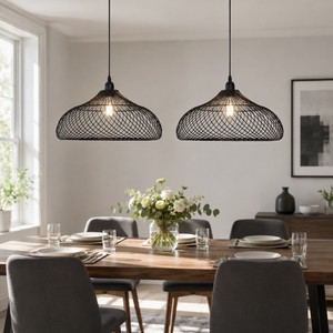 black iron pendant light in a sunlit breakfast nook