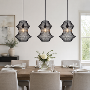black rattan iron pendant light in a sunlit breakfast nook