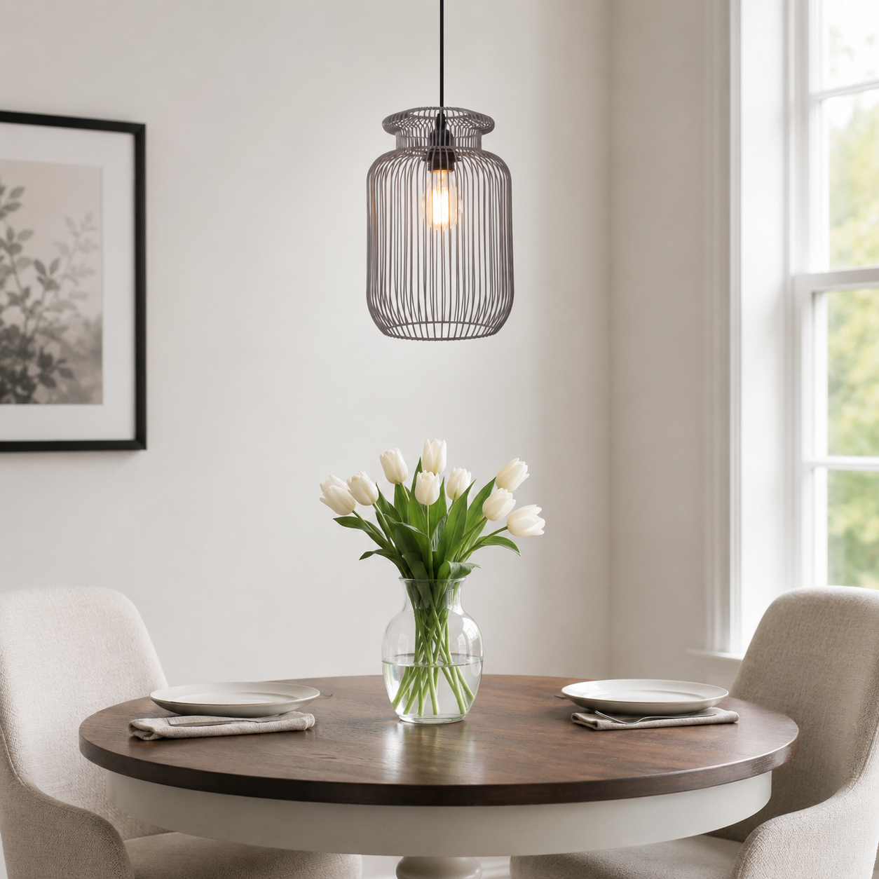 grey iron pendant light above a bright dining table