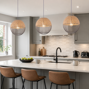 rattan iron globe pendant light over a warm kitchen counter