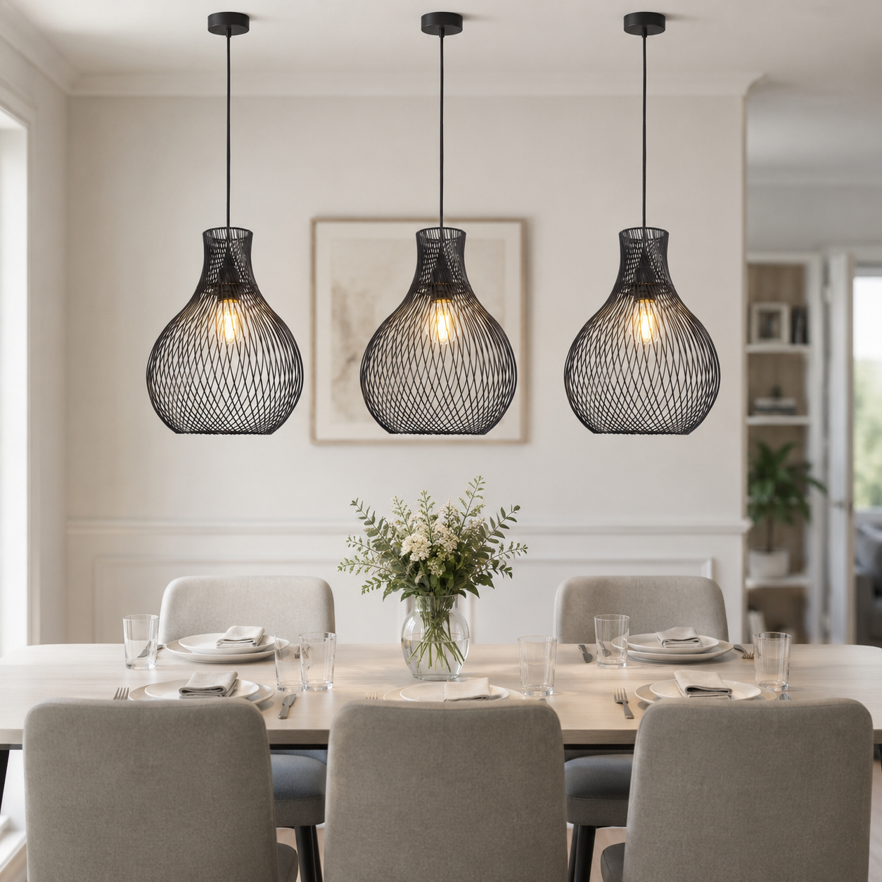 black iron pendant light over a warm kitchen counter