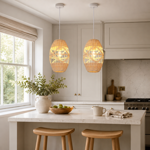 rattan oval pendant light above a bright dining table