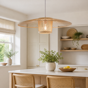 Fan-shaped bamboo pendant over a bright kitchen dining table