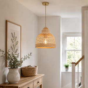 rattan pendant light over a warm kitchen counter