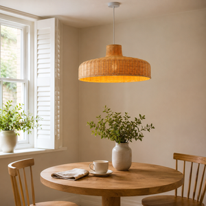 rattan pendant light in a sunlit breakfast nook