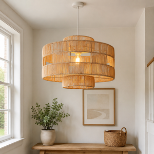 rattan pendant light beside a bright window