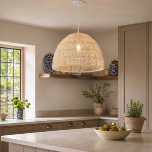 Woven paper rope ceiling pendant above a kitchen island