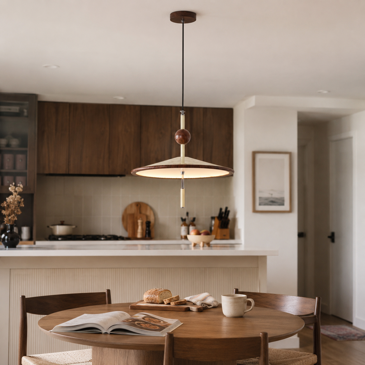beige iron pendant light above a kitchen dining table