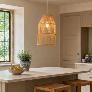 rattan pendant light beside a bright window