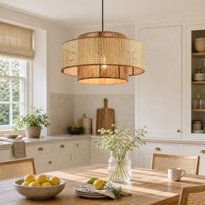 Natural rattan and hemp rope pendant over a bright kitchen island