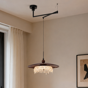 walnut folding acrylic pendant light with folding acrylic shade and wall-mounted arm
