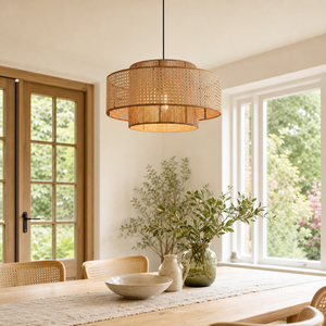 Natural woven pendant by a bright dining room window