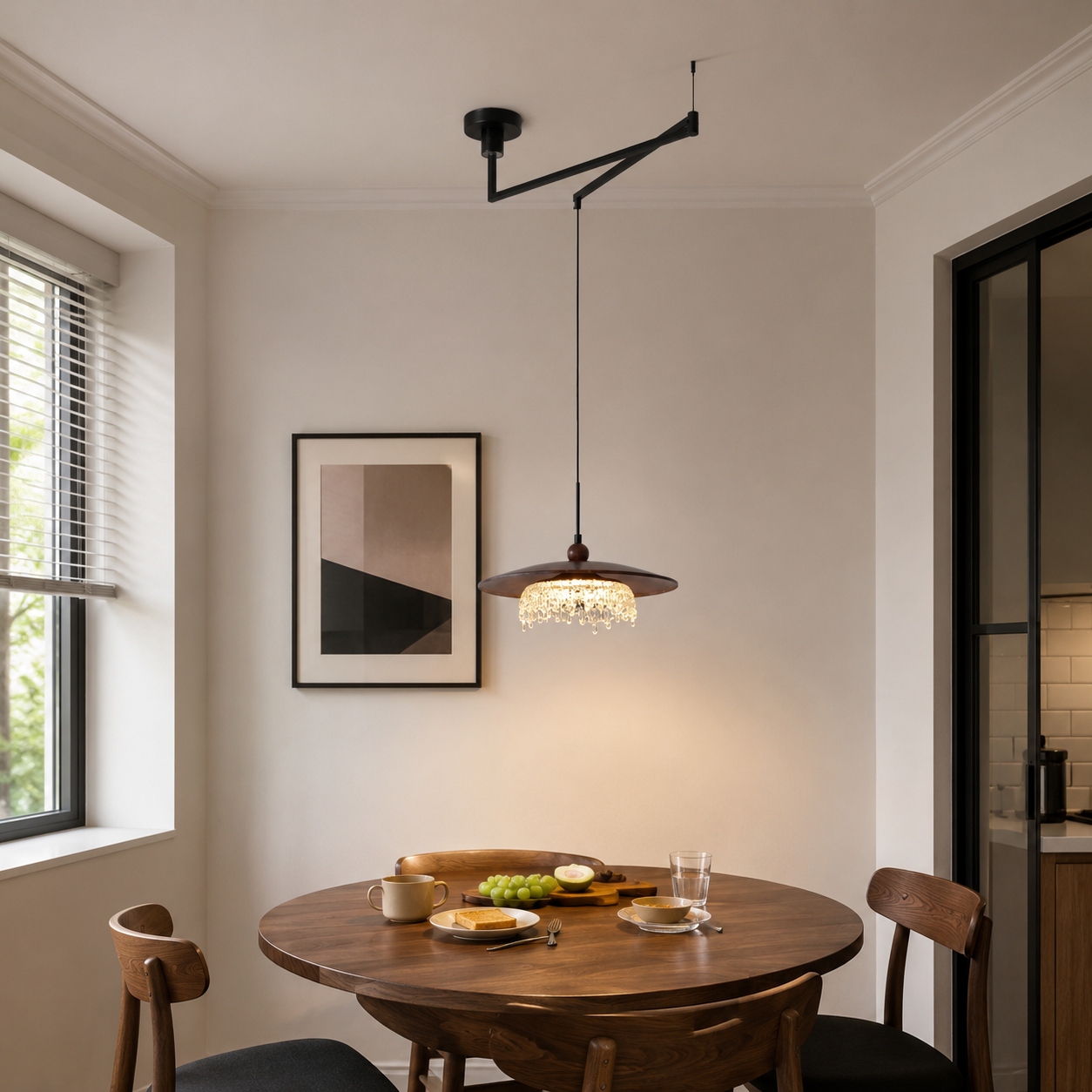 walnut folding acrylic pendant light above a dining table in a neutral room