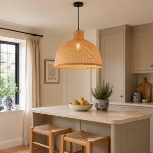 Bamboo dome pendant light above a warm kitchen island