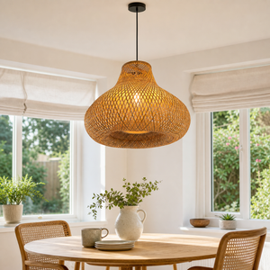 Bamboo gourd pendant in a sunlit round dining nook
