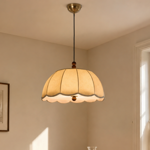 yellow fabric pendant light with scalloped yellow fabric shade