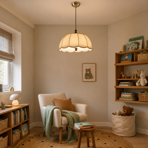 yellow fabric pendant light in a cosy reading corner