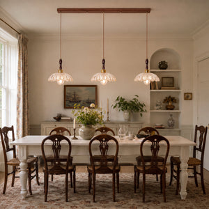 3-light walnut resin mini pendant adding warm light to a dining space