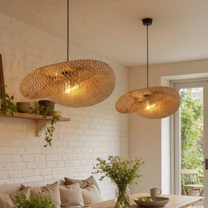 close view of two bamboo pendant lights above a kitchen dining area
